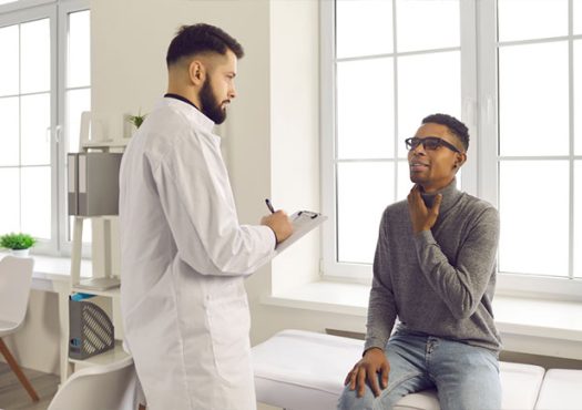 doctor examining patient